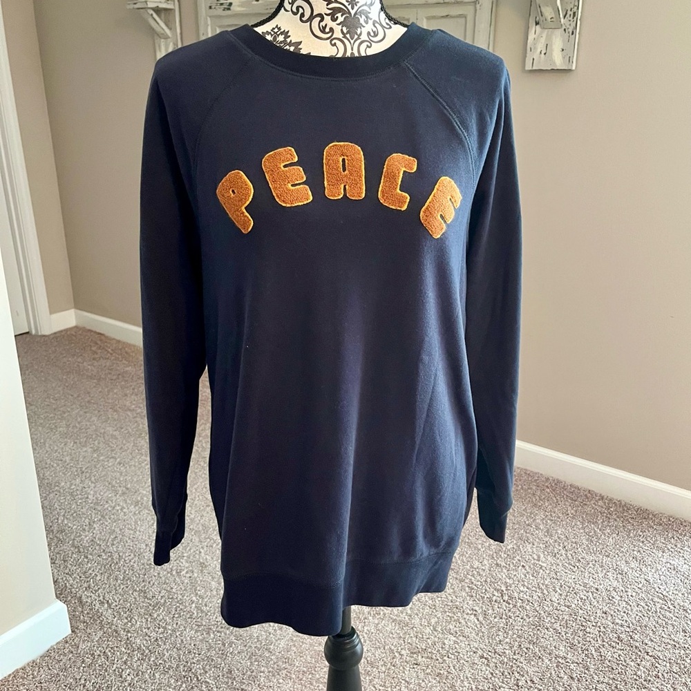 American Eagle Outfitters Navy Sweater with Gold Peace Design